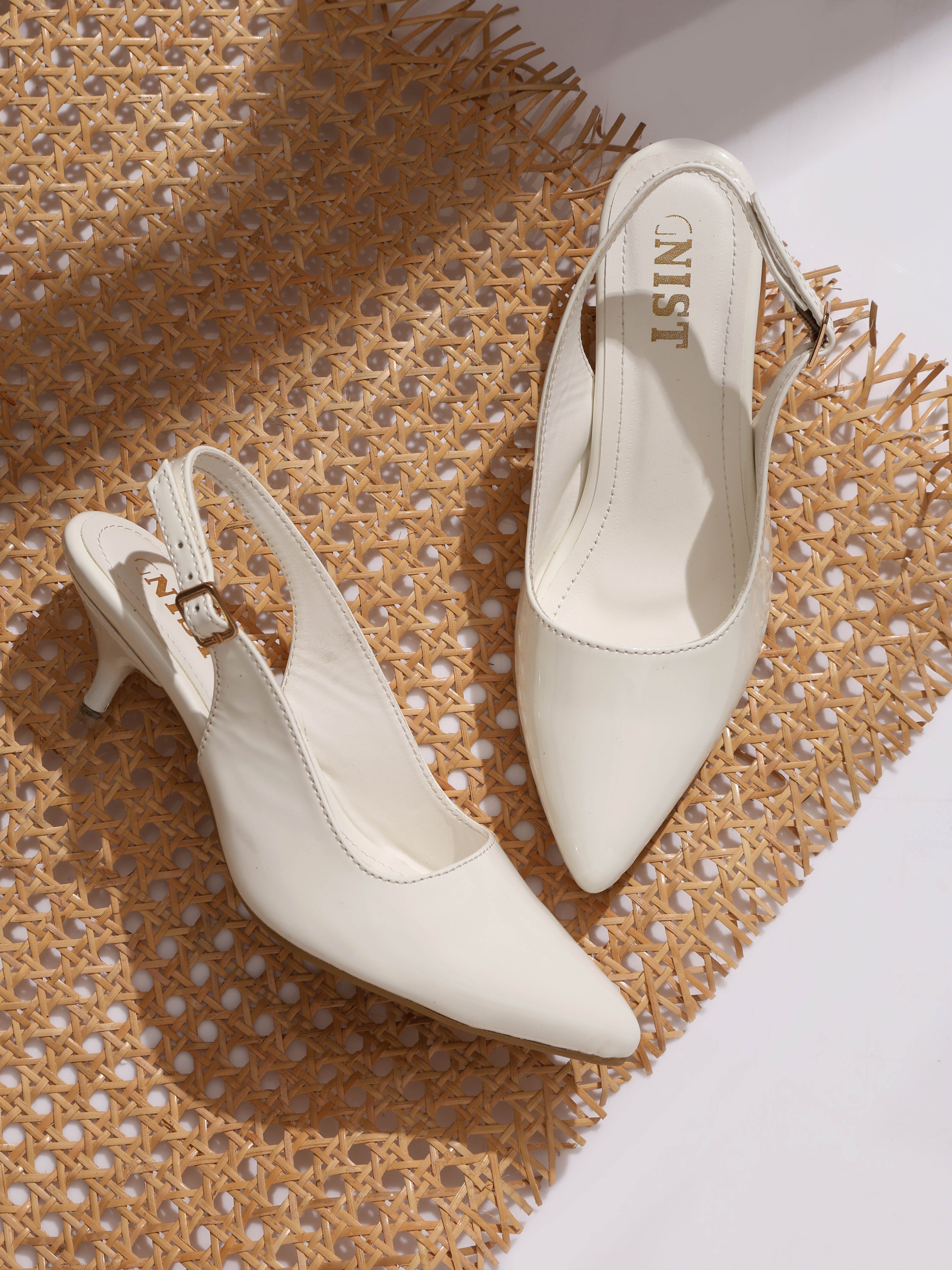 white heels with gold heel